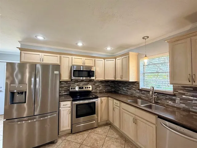an empty room with wooden floor