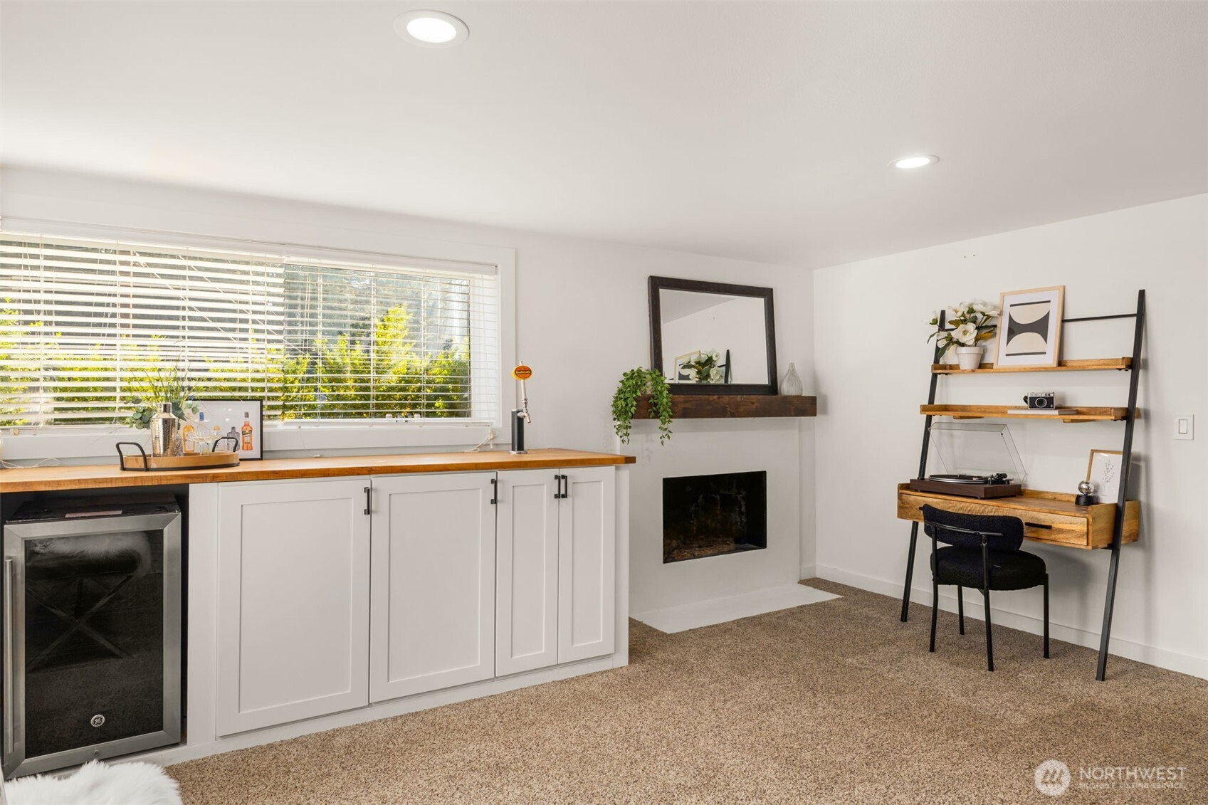 9417 235th Place Southwest Edmonds, WA 98020 - Photo 20 of 30 a kitchen with furniture and a fireplace