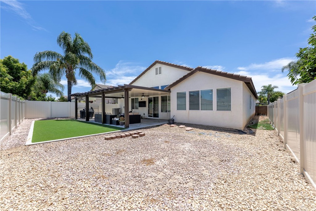 27100 Early Dawn Road Menifee, CA 92584 - Photo 6 of 71 Low Maintenance Large Back Yard includes gravel and artificial turf