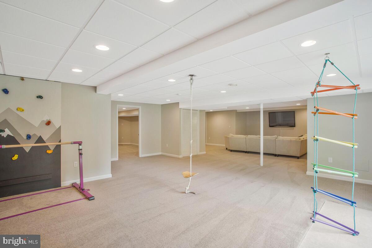 175-m F M F Bowen Road Huntingtown, MD 20639 - Photo 37 of 47 a view of a livingroom with gym equipment