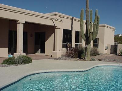 817 West Sedona Ridge Place Oro Valley, AZ 85755 - Photo 6 of 6 a view of a house with a yard