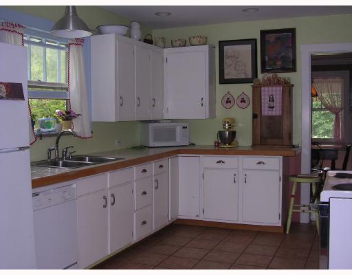 366 Old Plank Road Butler, PA 16002 - Photo 4 of 8 Kitchen. Generous size kitchen with tile counter top and ceramic tiled floor.