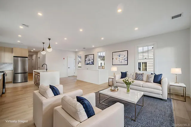 a living room with furniture and a table