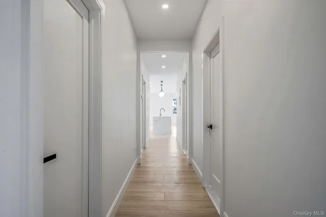 a view of a bathroom from the hallway
