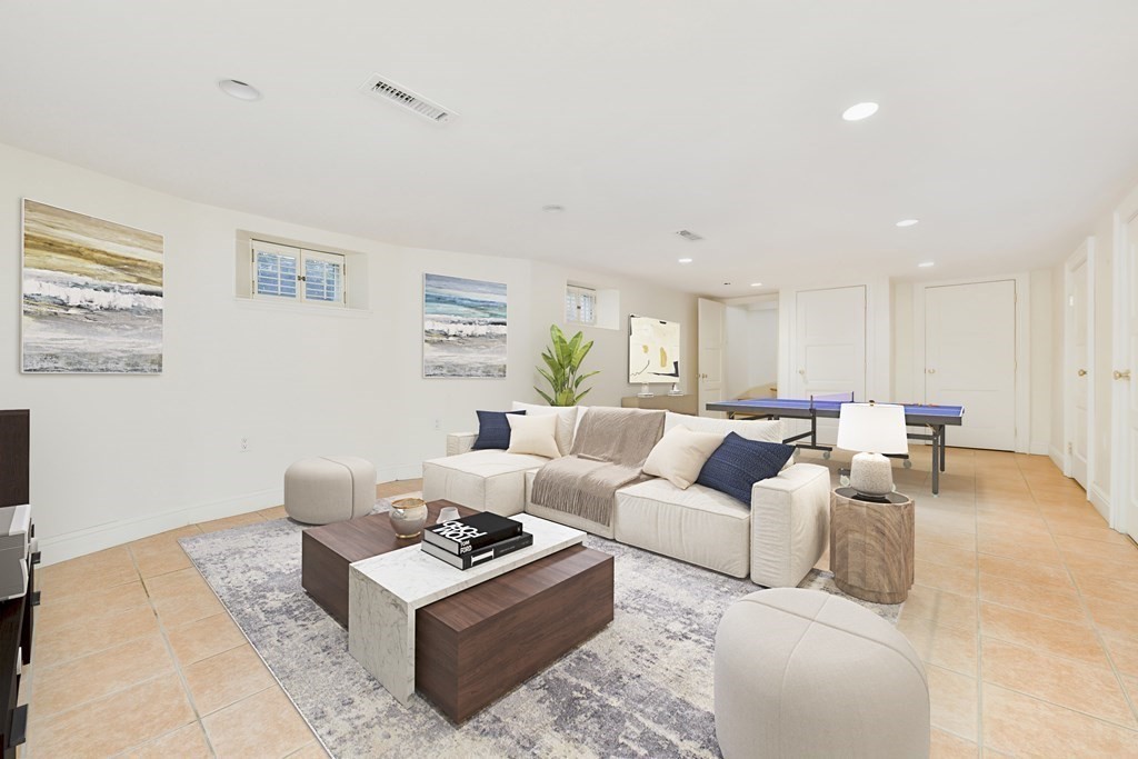 35 Blakeslee Street Cambridge, MA 02138 - Photo 13 of 31 a living room with furniture a rug and a window