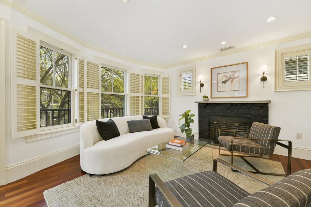 35 Blakeslee Street Cambridge, MA 02138 - Photo 20 of 31 a living room with furniture and a fireplace