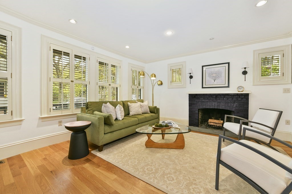 35 Blakeslee Street Cambridge, MA 02138 - Photo 2 of 31 a living room with furniture and a fireplace