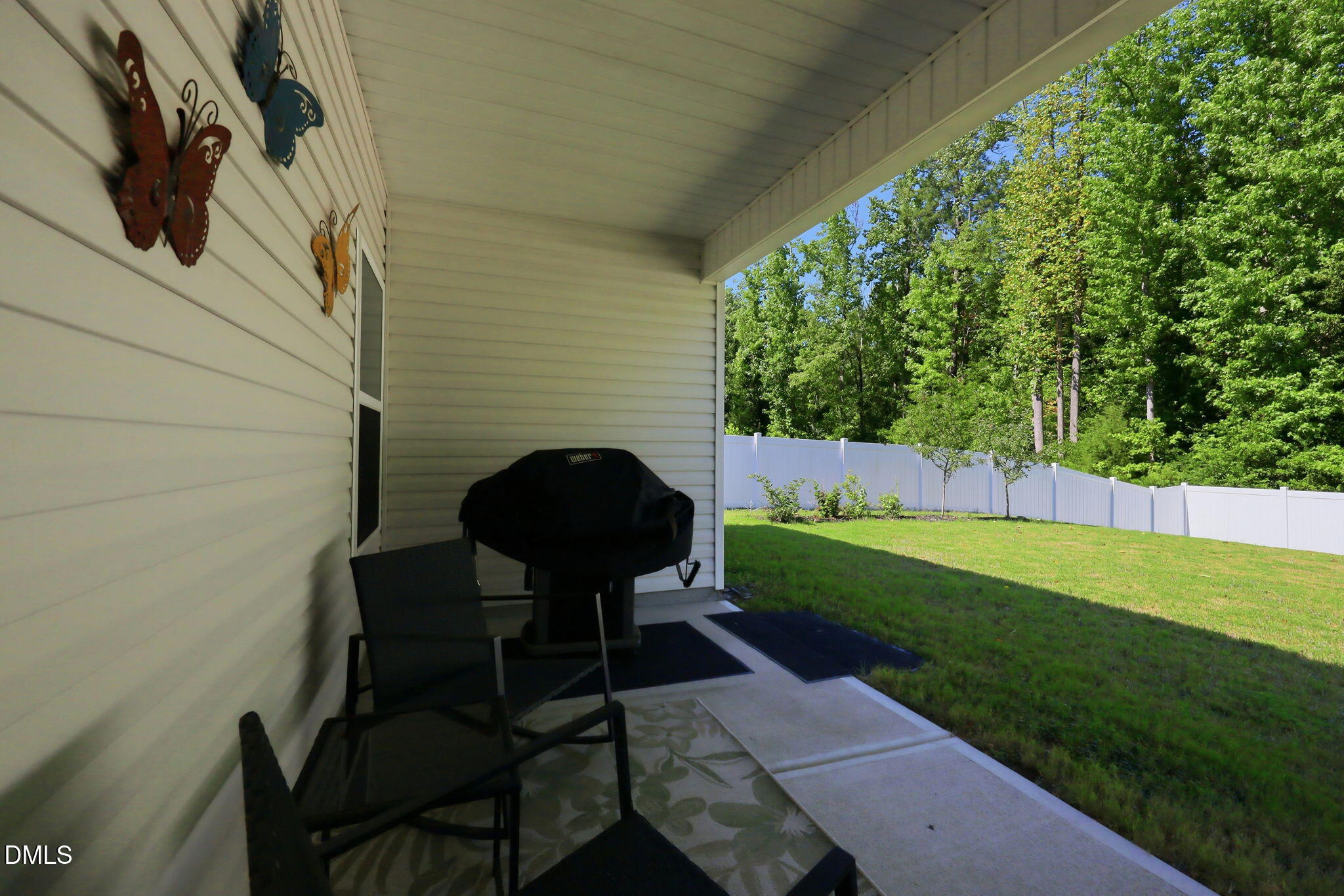 7012 Vanover Drive Raleigh, NC 27604 - Photo 27 of 41 Covered Porch Overlooks Fenced Yard