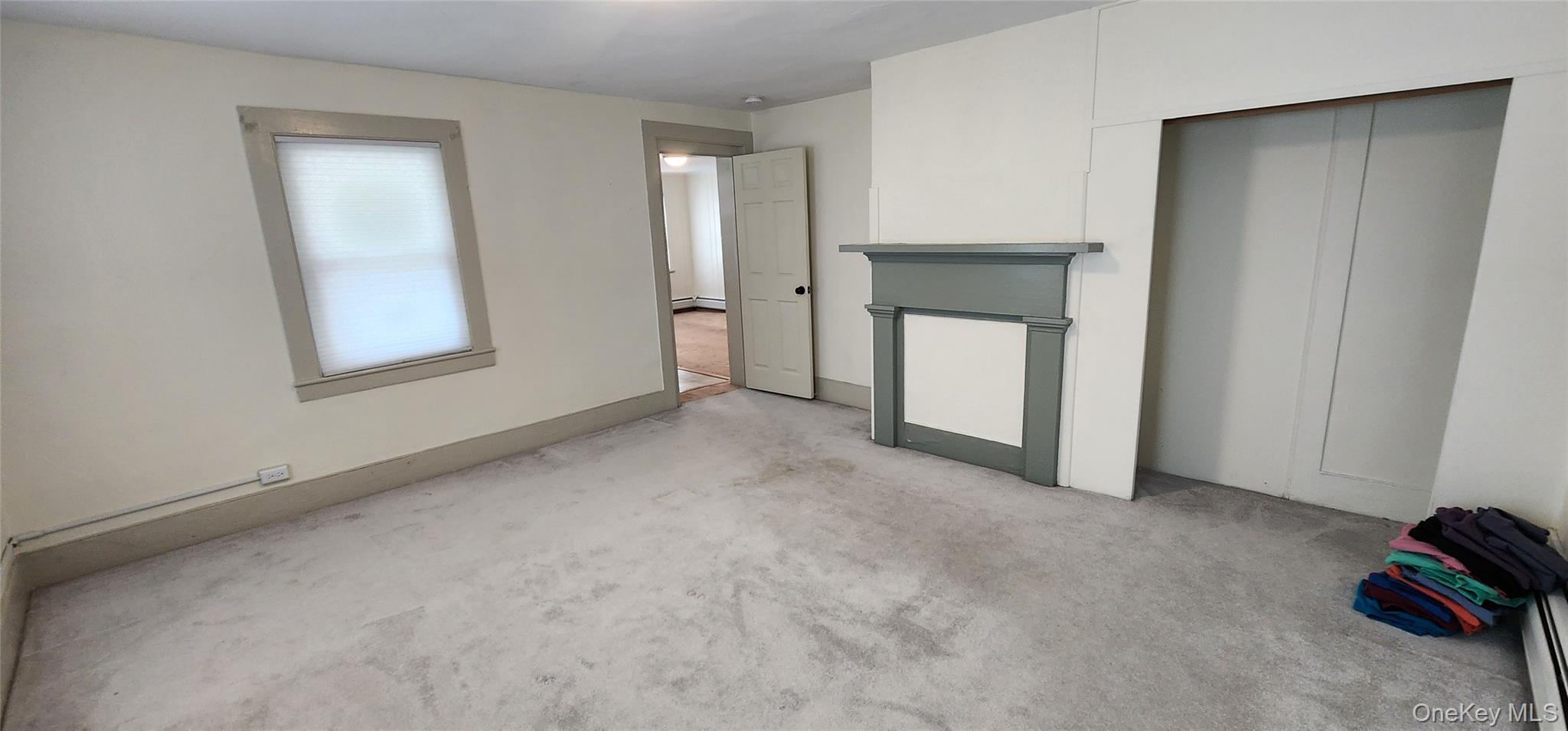 6 Lower Brook Road Sparrowbush, NY 12780 - Photo 8 of 18 a view of an empty room with window and closet area