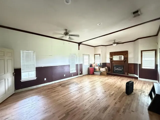 a bedroom with bed and a walk in closet