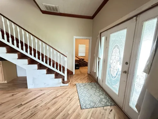 a bathroom with a sink toilet and a mirror