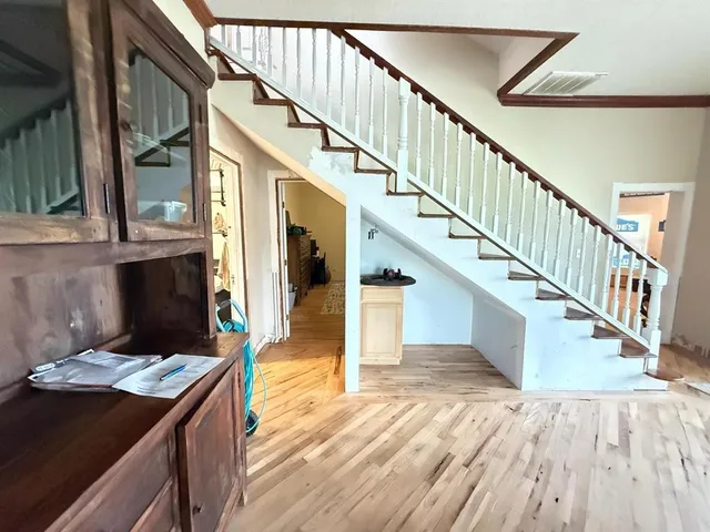 a bedroom with a bed and furniture