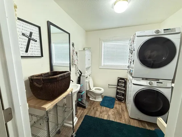 a living room with a couch and a stove top oven