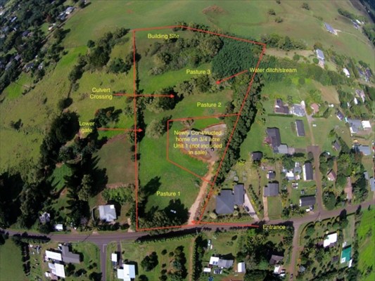 1093 Puuopae Road, Unit 2 Kapaa, HI 96746 - Photo 3 of 24 an aerial view of a residential houses with outdoor space