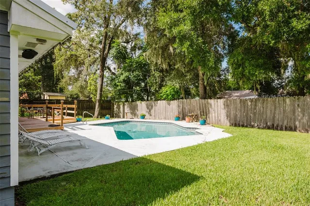 a view of backyard with green space