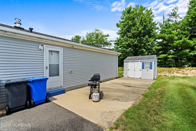 a utility room with a sink dryer and washer