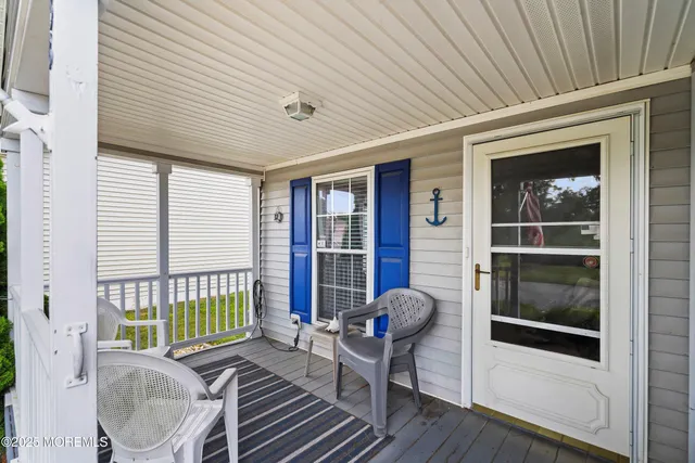 a view of a porch with furniture