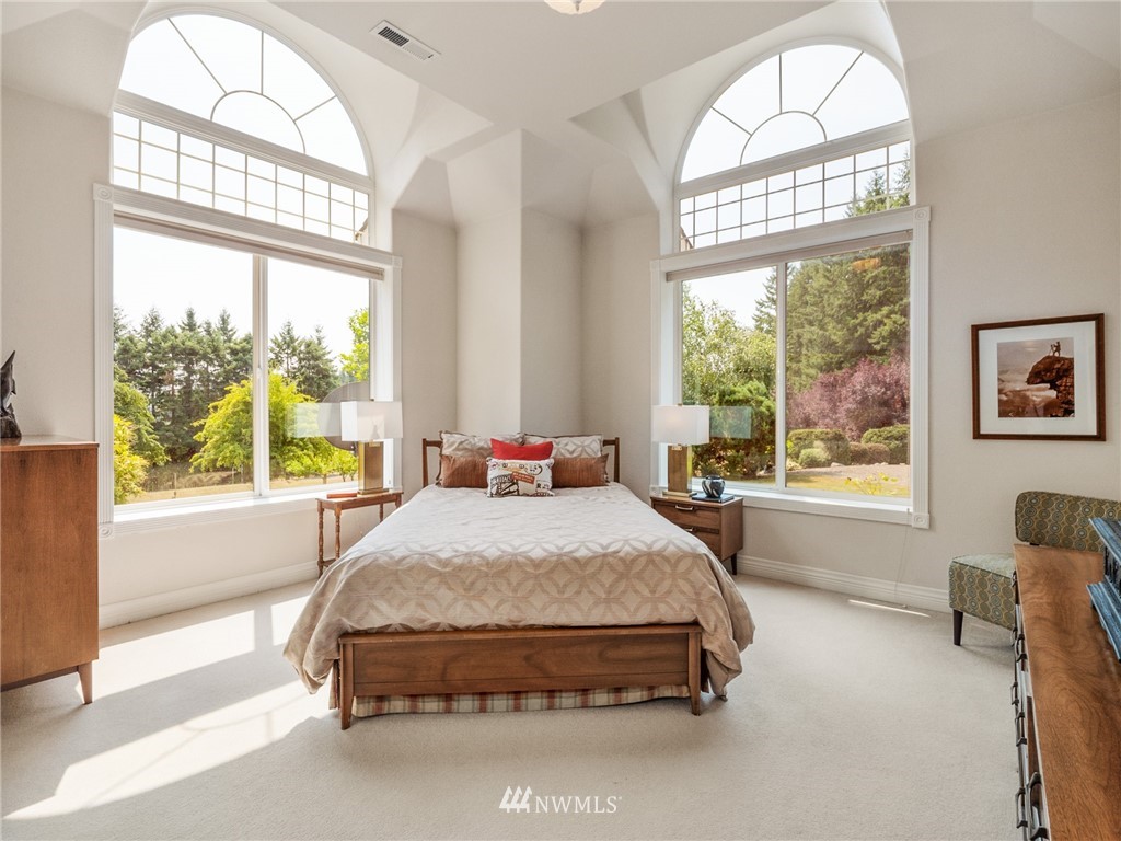 2599 Seminary Hill Road Centralia, WA 98531 - Photo 14 of 29 a bed sitting in a bedroom next to a window