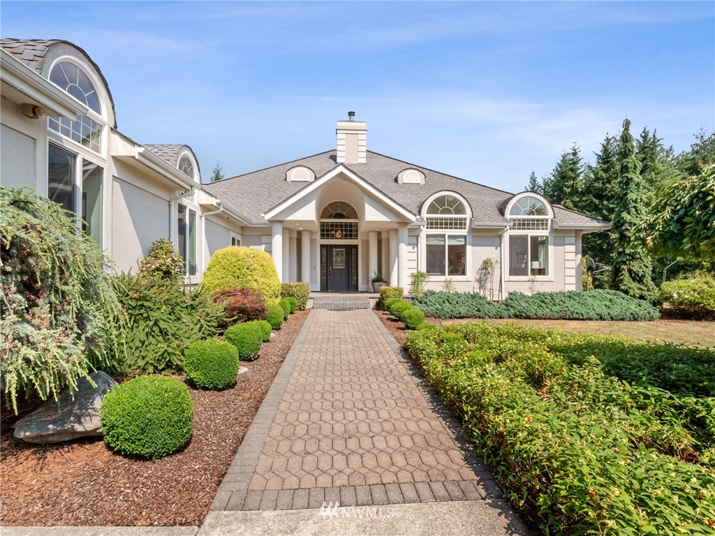 2599 Seminary Hill Road Centralia, WA 98531 - Photo 2 of 29 a front view of a house with a garden