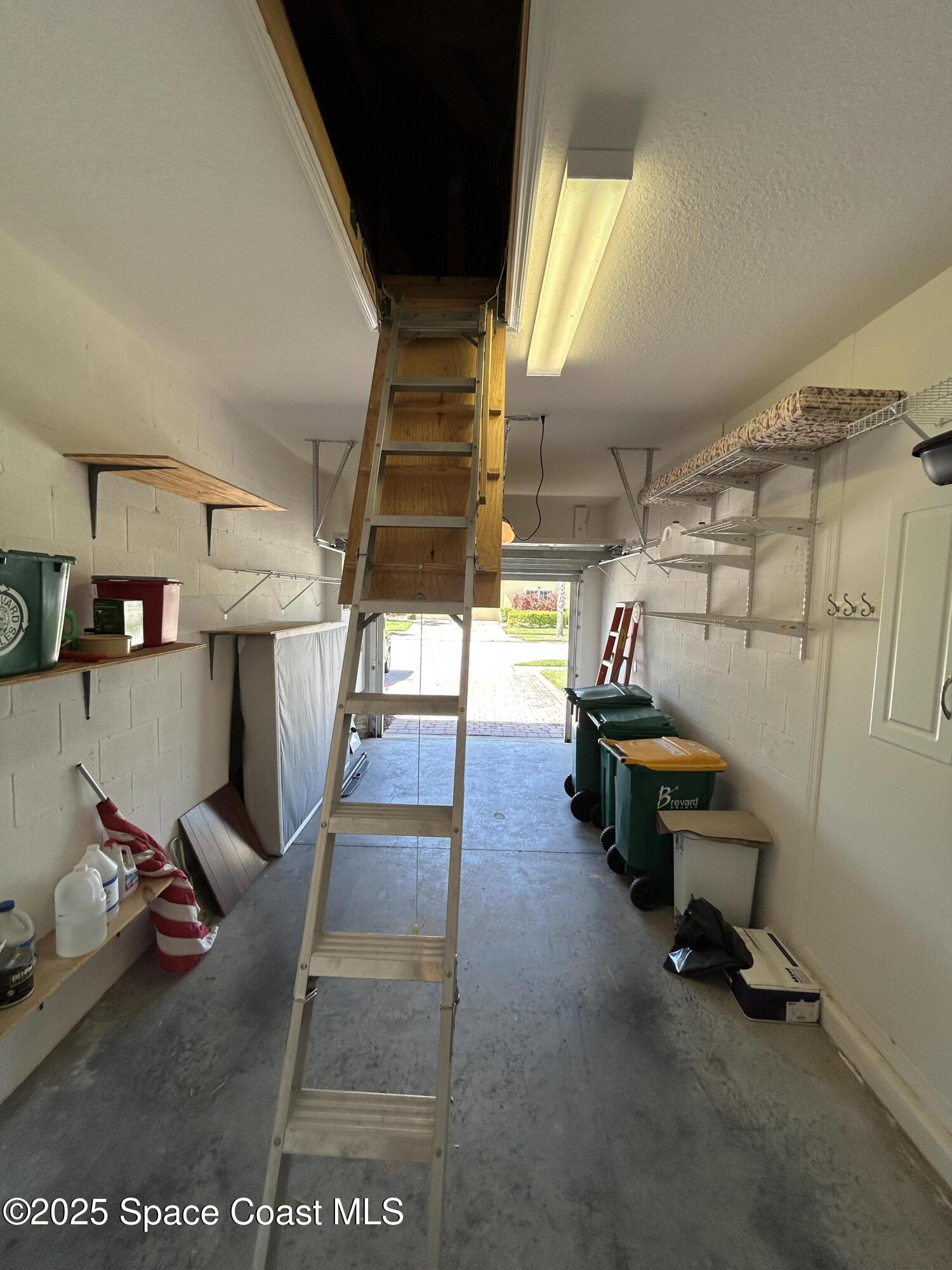 3541 Funston Circle Melbourne, FL 32940 - Photo 34 of 79 Garage Pull Down Stairs