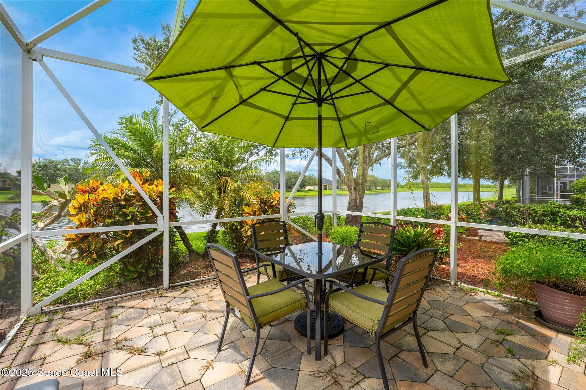 3541 Funston Circle Melbourne, FL 32940 - Photo 39 of 79 Screened Porch overlooks Lake