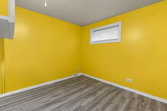 a view of a big room with wooden floor
