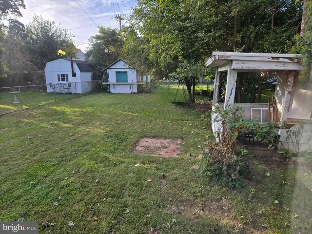 a room with furniture toys and a window