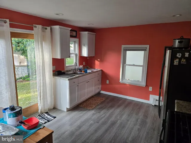 a workspace with furniture and window