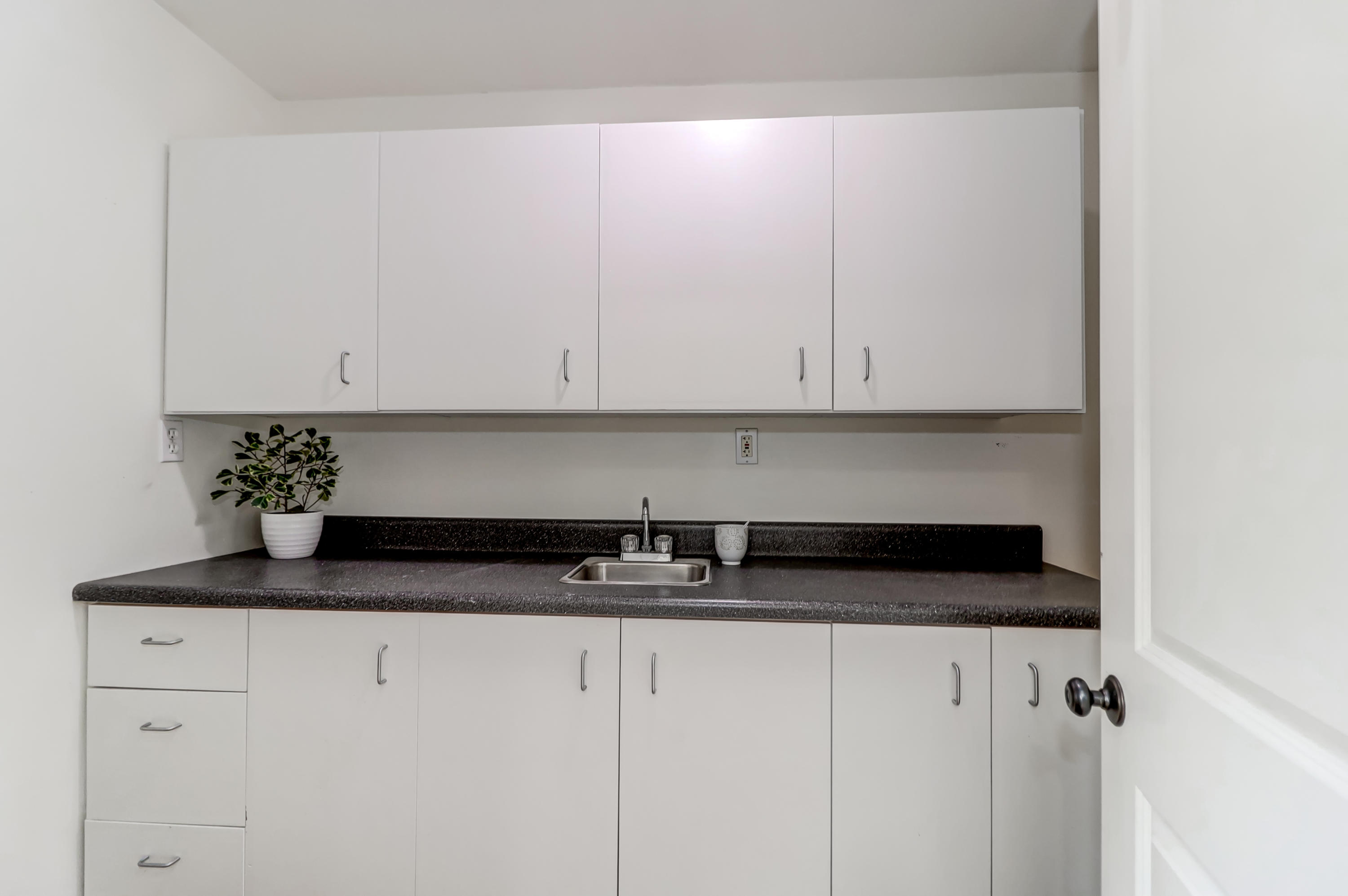 6717 Bears Bluff Road Wadmalaw Island, SC 29487 - Photo 23 of 48 Utility Room