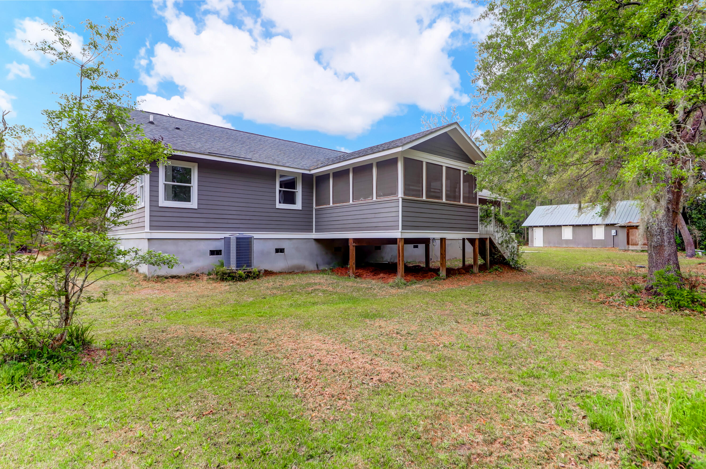 6717 Bears Bluff Road Wadmalaw Island, SC 29487 - Photo 38 of 48 Rear Elevation