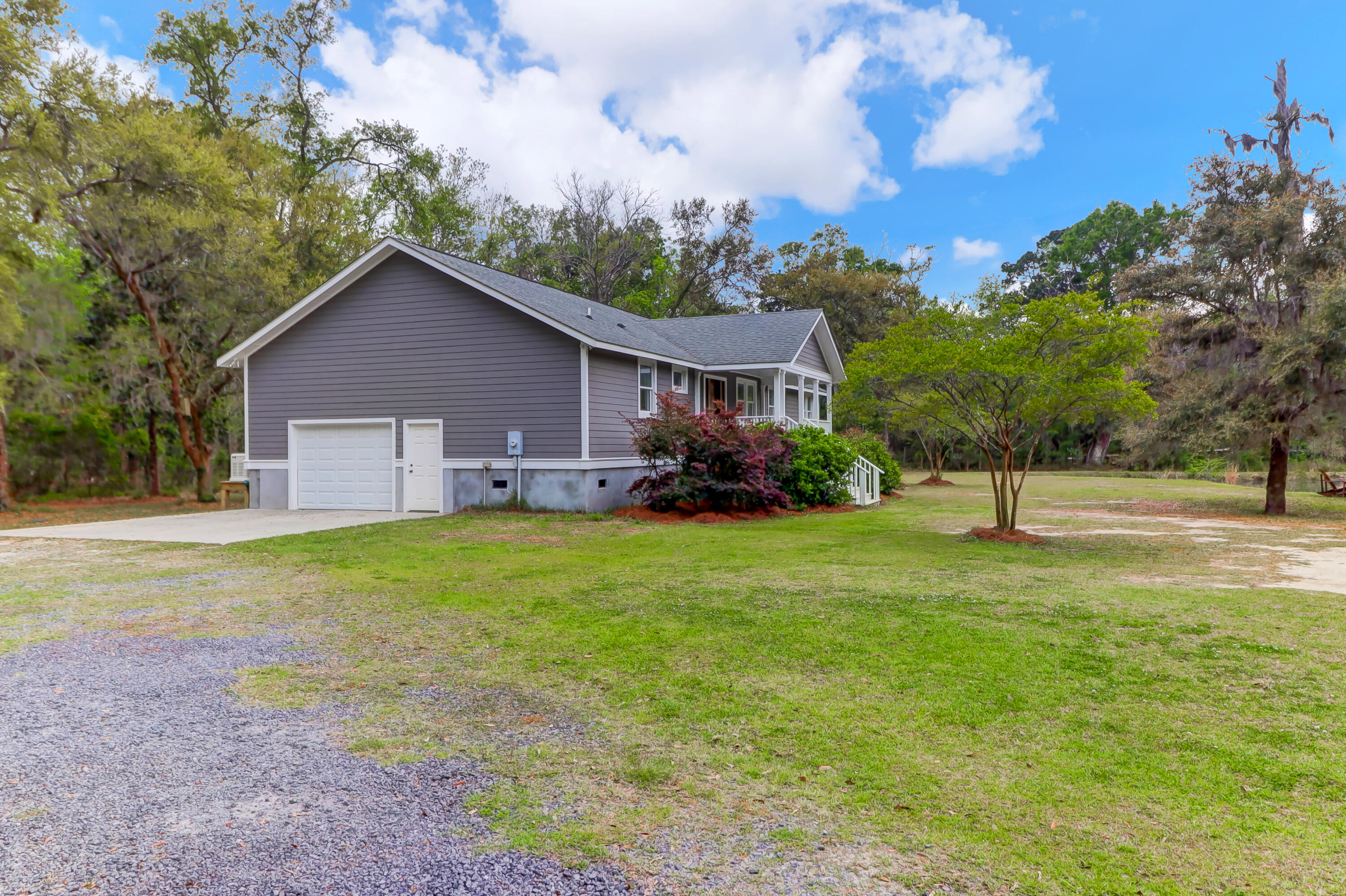 6717 Bears Bluff Road Wadmalaw Island, SC 29487 - Photo 40 of 48 Left Side Elevation