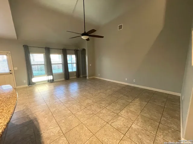 a view of an empty room and window