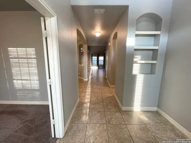 a view of gallery with windows