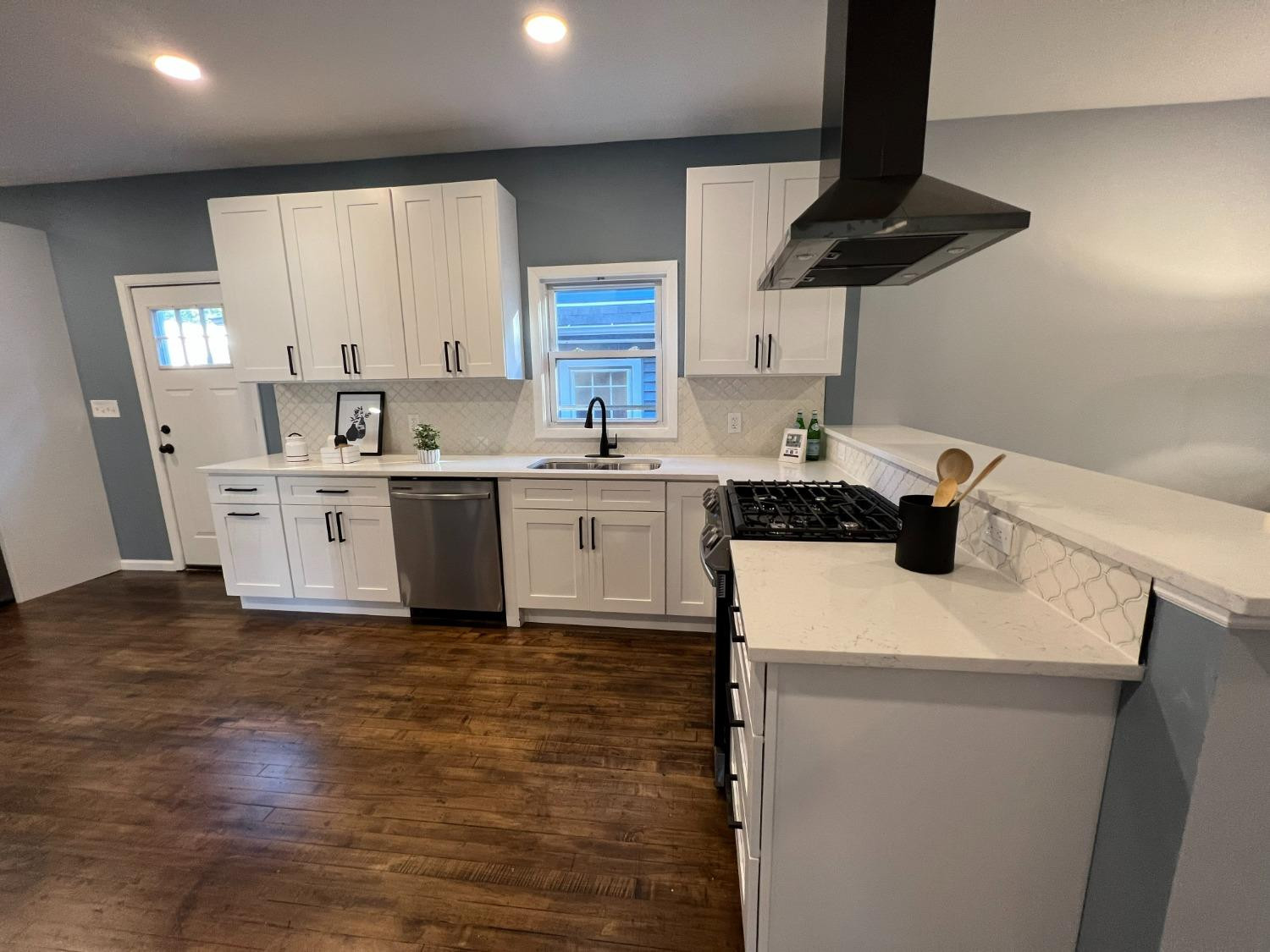 1509 Myrtle Avenue Whiting, IN 46394 - Photo 7 of 26 a kitchen with a sink a stove and cabinets