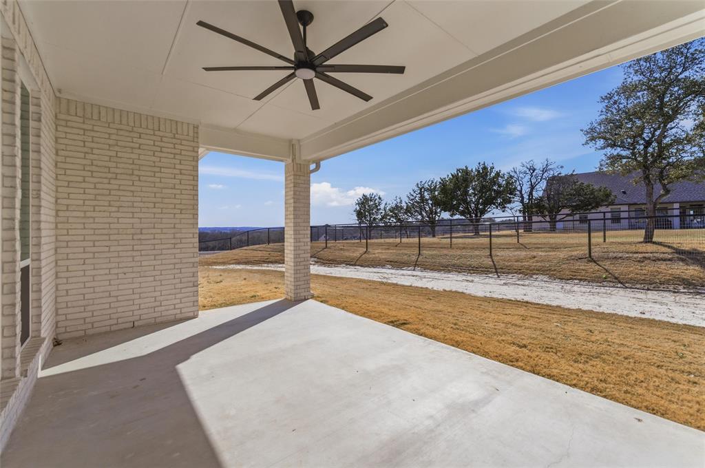 1038 Deer Island Azle, TX 76020 - Photo 25 of 32 a view of an empty room with a chandelier