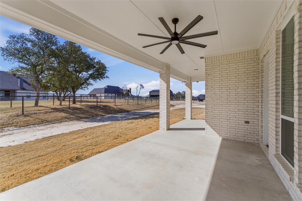 1038 Deer Island Azle, TX 76020 - Photo 26 of 32 a view of a house with a swimming pool