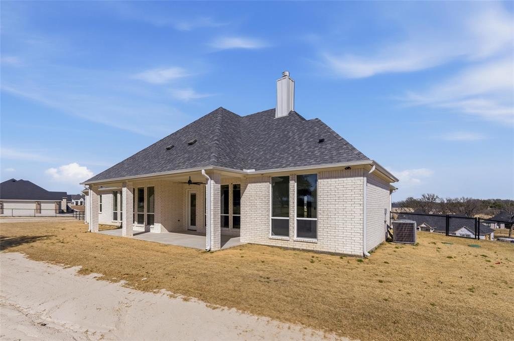 1038 Deer Island Azle, TX 76020 - Photo 27 of 32 a house with a outdoor space