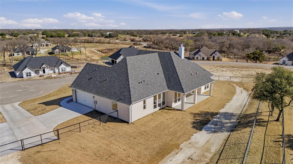 1038 Deer Island Azle, TX 76020 - Photo 30 of 32 an aerial view of a house with a ocean view