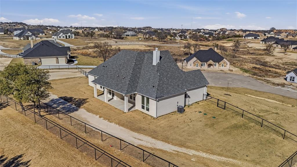 1038 Deer Island Azle, TX 76020 - Photo 31 of 32 an aerial view of residential houses with outdoor space