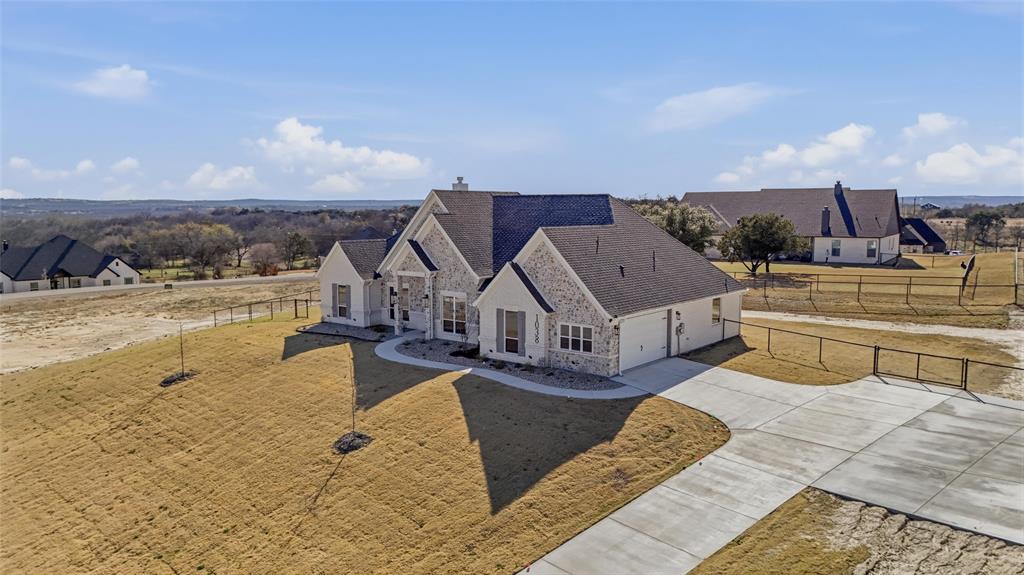 1038 Deer Island Azle, TX 76020 - Photo 4 of 32 a view of a house with a ocean view
