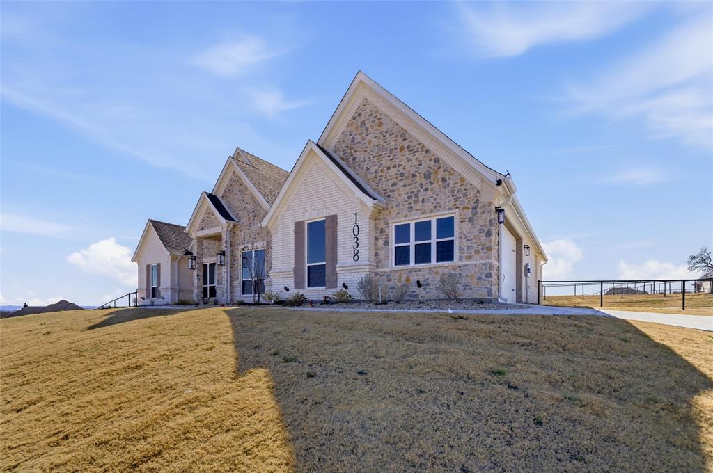 1038 Deer Island Azle, TX 76020 - Photo 6 of 32 a view of a house with a yard