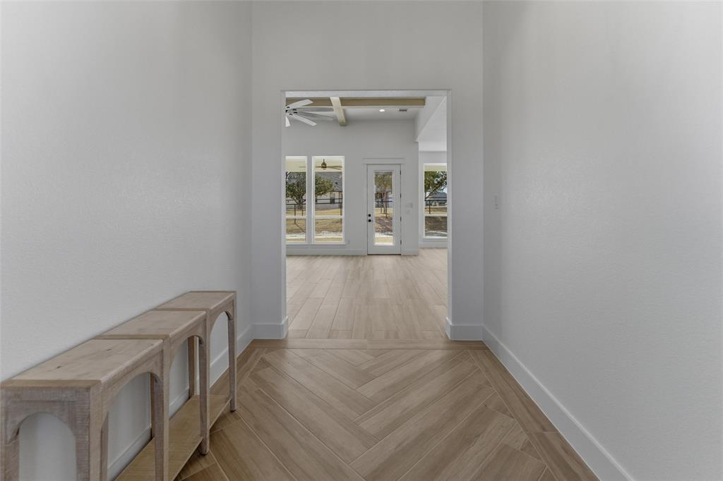 1038 Deer Island Azle, TX 76020 - Photo 7 of 32 a view of an empty room with a window