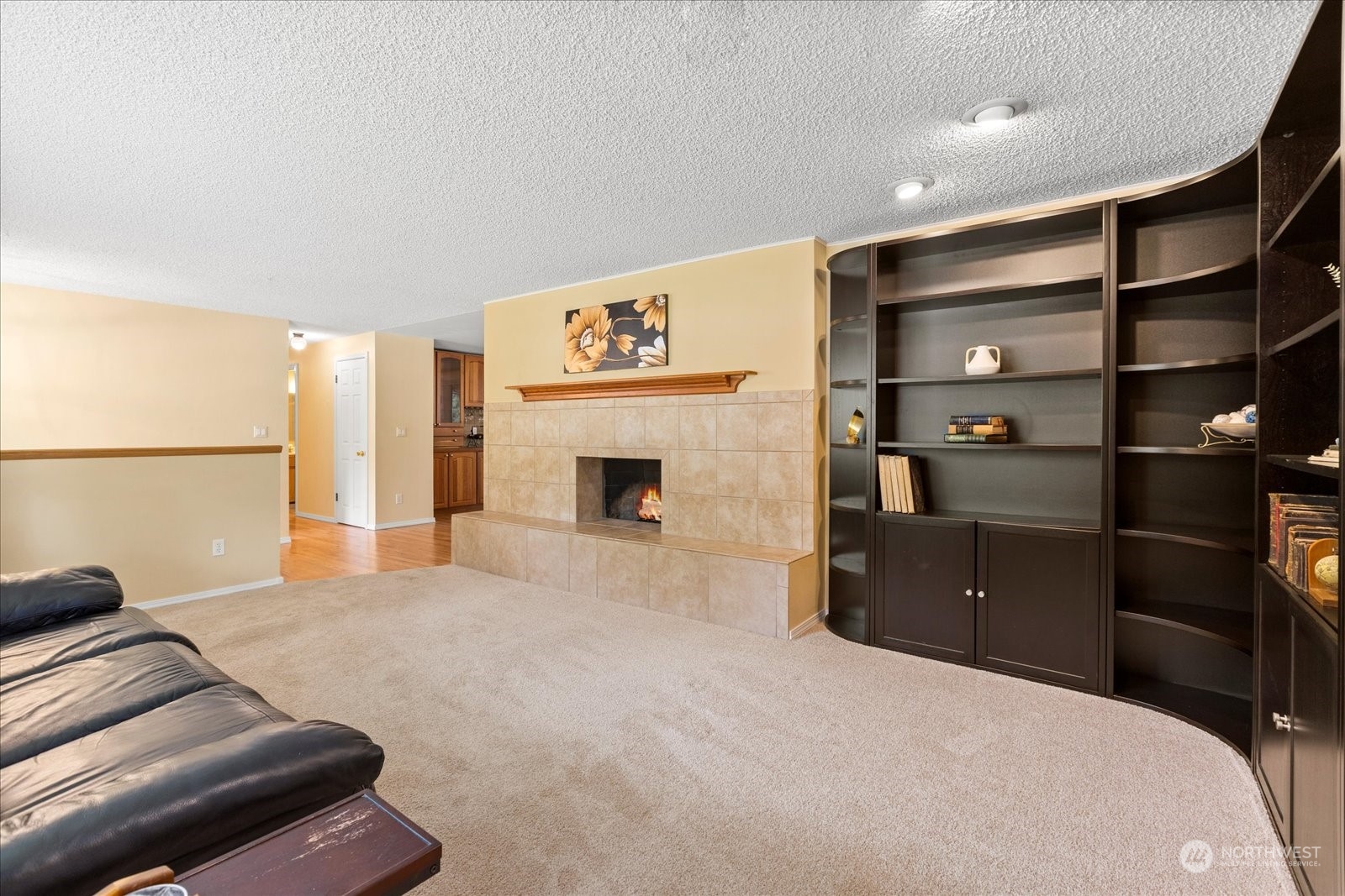 20403 Southeast 145th Street Renton, WA 98059 - Photo 8 of 39 a bedroom with a bed and a fireplace