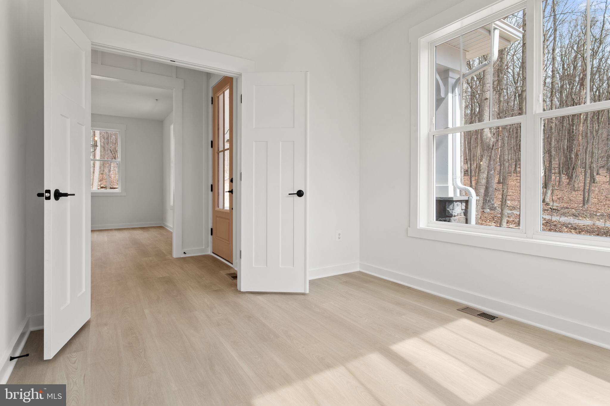 6512 Shady Side Road Shady Side, MD 20764 - Photo 12 of 29 a view of an empty room with a window