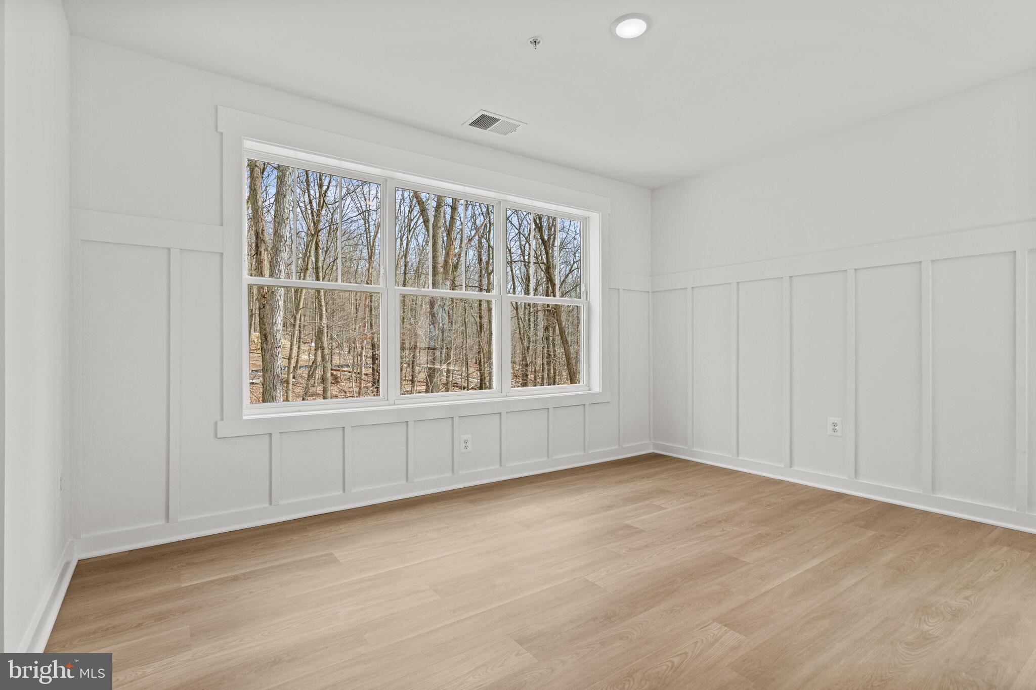 6512 Shady Side Road Shady Side, MD 20764 - Photo 19 of 29 a view of an empty room with a window