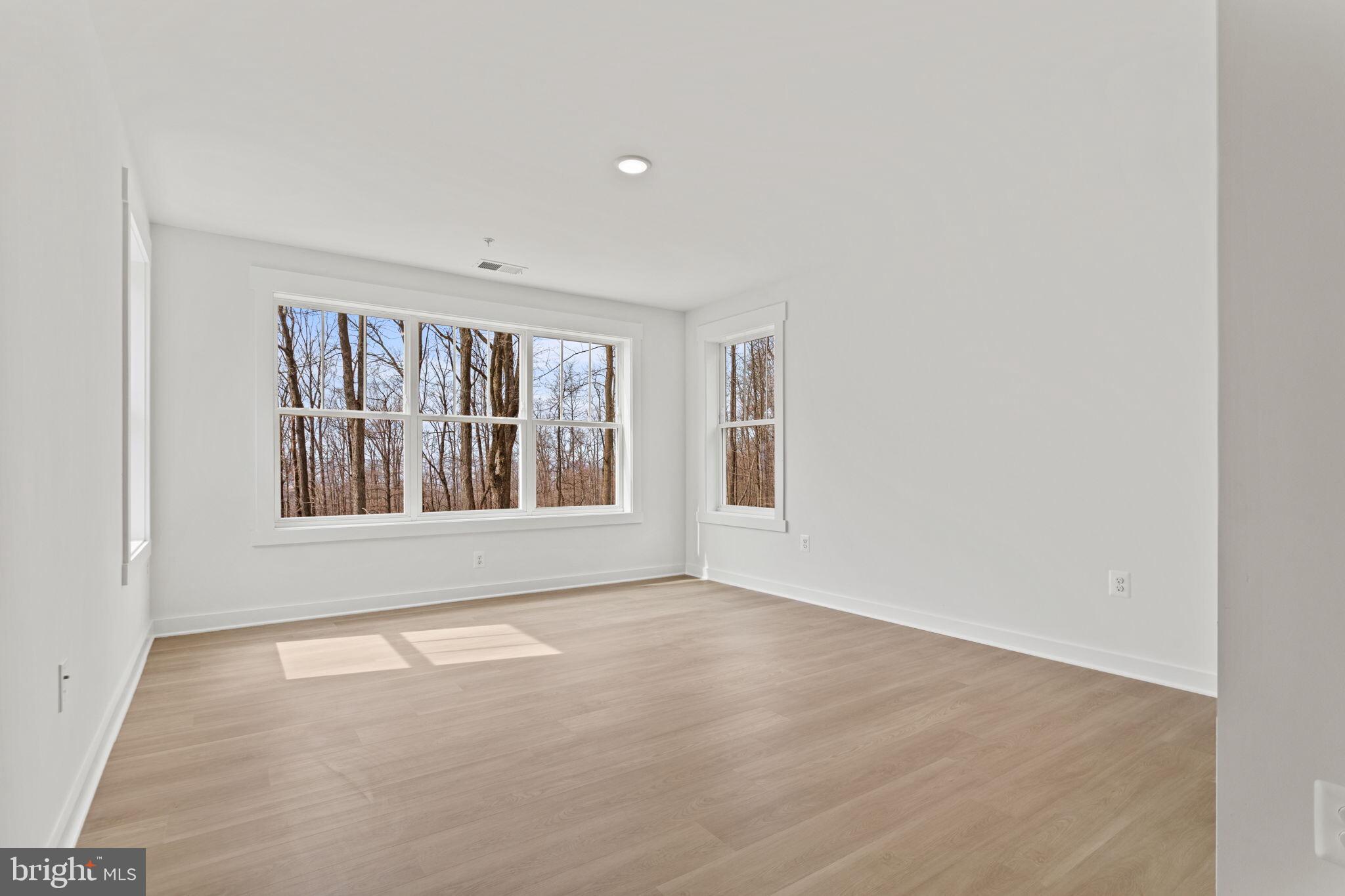 6512 Shady Side Road Shady Side, MD 20764 - Photo 21 of 29 a view of an empty room with a window