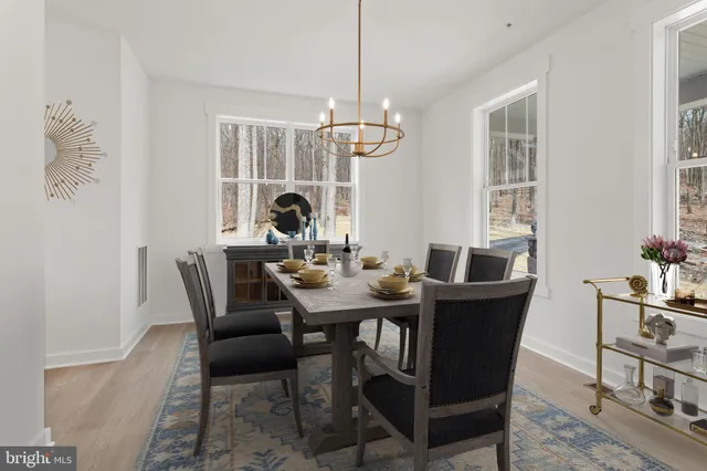 a bedroom with a bed and glass window