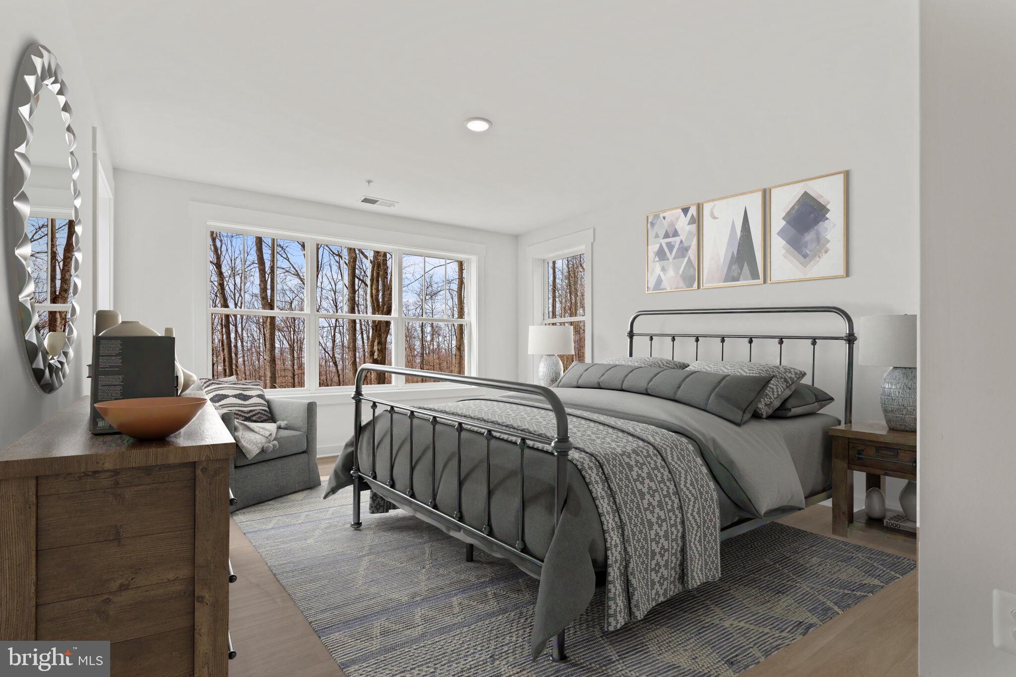 6512 Shady Side Road Shady Side, MD 20764 - Photo 28 of 29 a bedroom with a bed and glass window