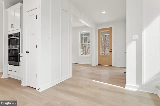 a view of a hallway with staircase