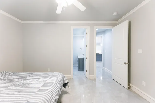 a living room with furniture stairs and a fireplace